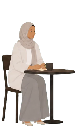 A team member in a hijab sitting and thinking a problem through.